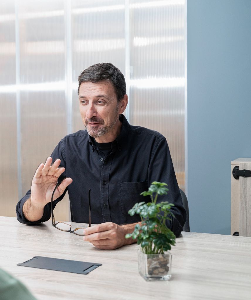 Victor E. Perazzoli in a strategy meeting